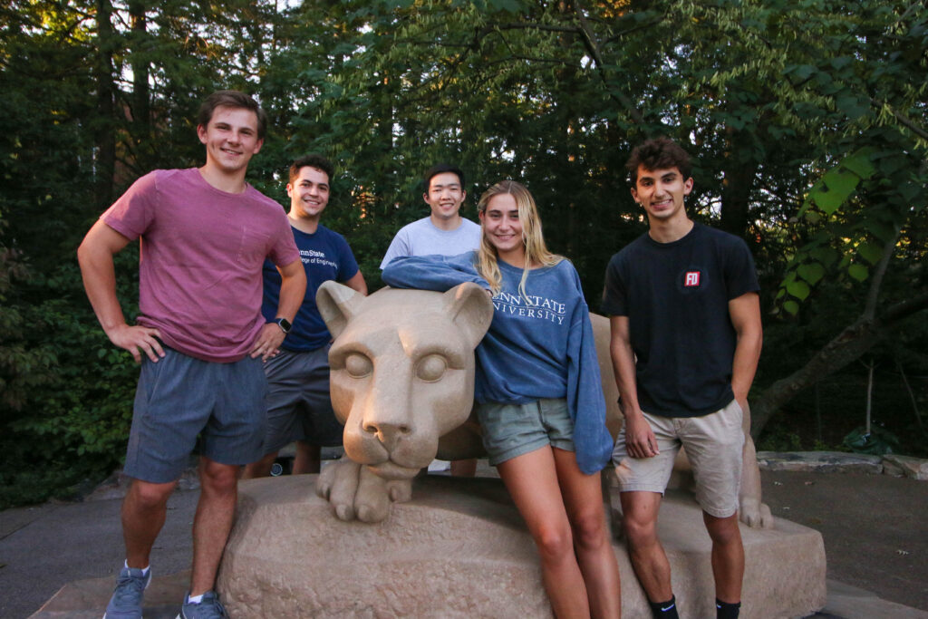 AIPR team members pose with the Nittany Lion Shrine on the Penn State University Park campus